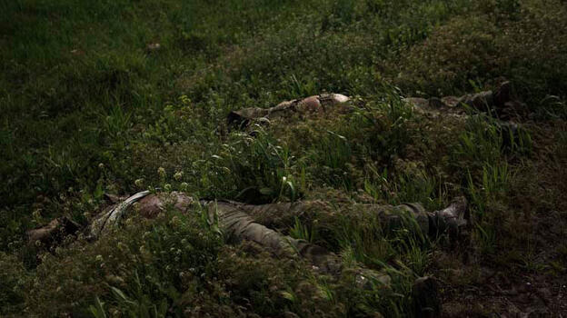 Rus ordusunun öldüremediği adam! Ukrayna'da kardeşlerinin cesetleri ile diri diri gömüldü ama...